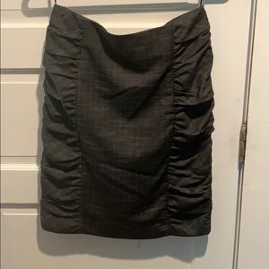 Dark gray skirt with details on sides